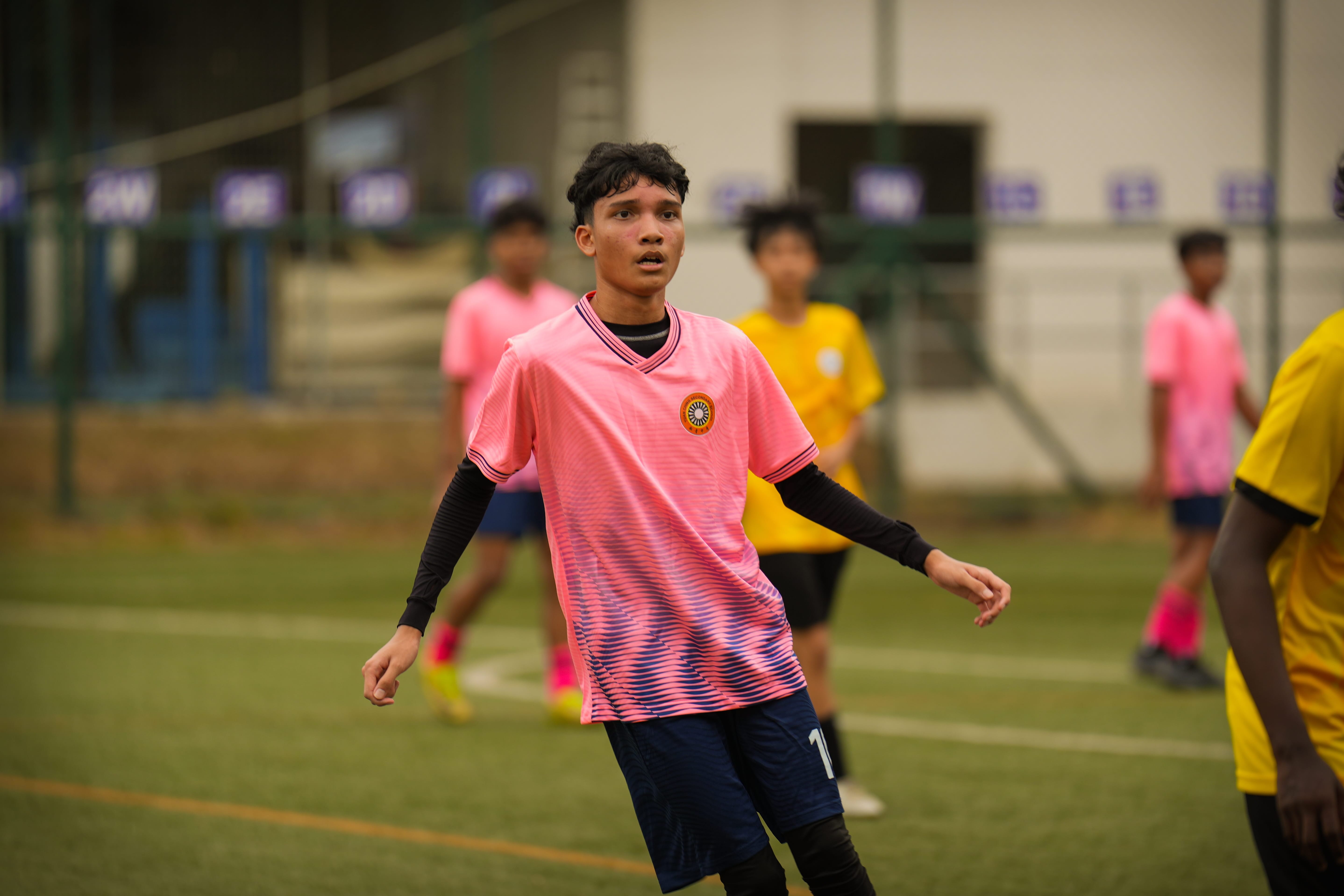Footballer thinking of the next action